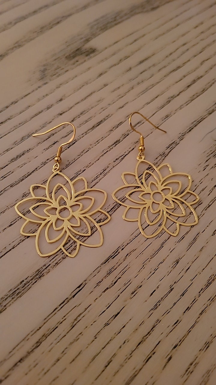 Elegant large gold tone hollow flower dangle earrings. Gold plated S925 ear wires